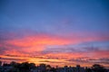 Beautiful cloudscape gradient from purple to orange sunrise in the early morning Royalty Free Stock Photo