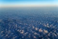 Beautiful cloudscape at sunrise from plane window Royalty Free Stock Photo