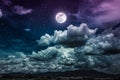 Night sky with bright full moon and dark cloud, serenity nature Royalty Free Stock Photo