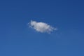 Beautiful cloudscape of nature single white cloud only one on blue sky background Royalty Free Stock Photo