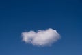 Beautiful cloudscape of nature single white cloud only one on blue sky background in daytime Royalty Free Stock Photo