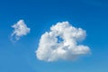 Beautiful cloudscape of nature single white cloud only one on blue sky background Royalty Free Stock Photo