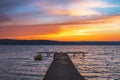 Beautiful cloudscape over the lake and blured boat