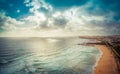 Beautiful cloudscape over ocean coastline at sunset. Royalty Free Stock Photo