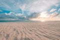 Beautiful cloudscape over the sea, sunrise horizon sand waves. Idyllic inspirational beach landscape Royalty Free Stock Photo