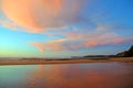 Beautiful cloudscape at Praia Vale Figueiras Portugal at sunset