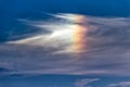 Beautiful cloudscape with a rainbow colorful cloud Royalty Free Stock Photo