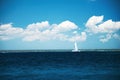 Beautiful cloudscape and sailing catamaran in the carribean sea Royalty Free Stock Photo