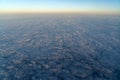 Beautiful cloudscape at sunrise from plane window Royalty Free Stock Photo