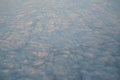 Beautiful cloudscape at sunrise from plane window Royalty Free Stock Photo