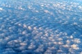 Beautiful cloudscape at sunrise from plane window Royalty Free Stock Photo