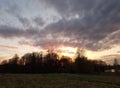 Beautiful cloudscape. Sunset landscape with forest. Royalty Free Stock Photo