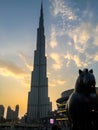 Beautiful cloudy day sunset outside Dubai Mall with an epic view of Burj Khalifa