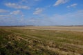 Beautiful cloudy sky over farmland. Spring landscape Royalty Free Stock Photo