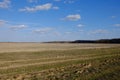 Beautiful cloudy sky over farmland. Spring landscape Royalty Free Stock Photo