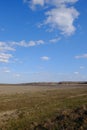 Beautiful cloudy sky over farmland. Spring landscape Royalty Free Stock Photo