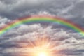 Beautiful cloudy sky with rainbow and sun Royalty Free Stock Photo