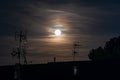 Beautiful cloudy sky with shining full moon Royalty Free Stock Photo