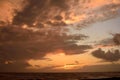 Beautiful cloudy sky during the sunset over the ocean Royalty Free Stock Photo