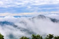 Beautiful clounds and fog coverage multiple mountains valley,travel concept