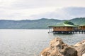 Beautiful coast and lush vegetation of the volcanic caldera Lake Coatepeque in Salvador. Royalty Free Stock Photo