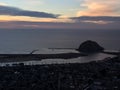 Morro Bay aerial photo at sunset with tall ships entering harbor