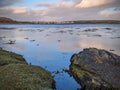 Beautiful coastal landscape scenery, wild Atlantic way, green hill, island, green grass beach at Silverstrand in Galway, Ireland Royalty Free Stock Photo