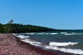 Beautiful Coastline of Lake Superior with Waves Crashing of Red Rocks Royalty Free Stock Photo