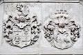 Riga, Latvia, November 2019. Ancient knight`s coats of arms on the wall of St. Peter`s Basilica.