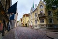 Beautiful cobbled street with its colorful medieval houses in the city