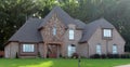 Beautiful Cobblestone and Brown Brick Suburban Home Royalty Free Stock Photo