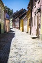 Beautiful cobblestone street in Romania in vertical format