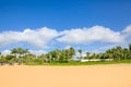 Beautiful coconut palms and beaches under blue skies and white clouds - haitang bay, hainan, China Royalty Free Stock Photo