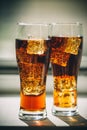 Beautiful cold fizzy cola soda with cubes ice Royalty Free Stock Photo