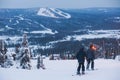 Beautiful cold mountain view of ski resort, sunny winter day with slope