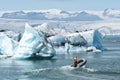 The beautiful cold winter landscape of the Jokulsarlon glacier lagoon, Iceland, in the winter with snow-capped mountain as a Royalty Free Stock Photo