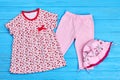 Beautiful collection of baby-girl clothes. Royalty Free Stock Photo