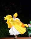 Beautiful Colombian traditional dance performer at scene