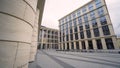 Beautiful colonnade of modern business building. Action. External corridor with rows of columns of business center