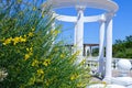 Beautiful colonnade of white color and a low fence Royalty Free Stock Photo