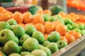 Beautiful color combination, variety of fresh raw fruits background display at market stall