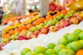 Beautiful color combination, variety of fresh raw fruits background display at market stall