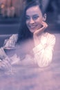 Nice happy woman looking at the wine Royalty Free Stock Photo