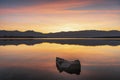 Beautiful color sunset landscape with swamp lake, with reflections of calm blurred water Royalty Free Stock Photo