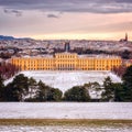 Beautiful color winter sunrise with panoramic view of the Schonbrunn Palace Schloss SchÃÂ¶nbrunn, garden and city of Vienna Royalty Free Stock Photo