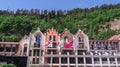 Beautiful colored building in European style and flags on it. Borjomi, Georgia Royalty Free Stock Photo