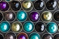 Beautiful colored coffee capsules on black background Royalty Free Stock Photo