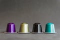 Beautiful colored coffee capsules on black background Royalty Free Stock Photo