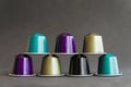 Beautiful colored coffee capsules on black background Royalty Free Stock Photo