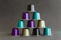 Beautiful colored coffee capsules on black background Royalty Free Stock Photo